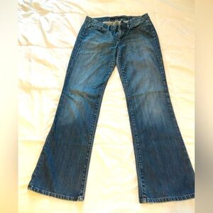Joe’s jeans boot cut, size 29. Women’s denim. wear and tear by the belt loops C
